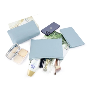 Three-piece light blue PU leather makeup bag set for women with textured finish