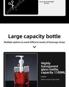 Macro detail of 1100ml glass syrup bottle with capacity scale and adjustable white pump