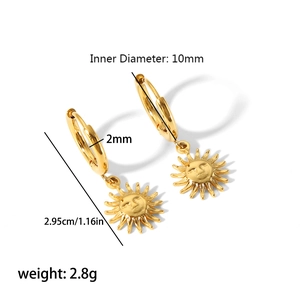 Polished 18K gold hoop earrings with sun god face charms and 10mm inner diameter