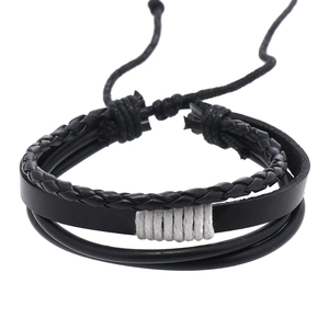Multilayer braided black leather bracelet for men with white cotton rope on white background