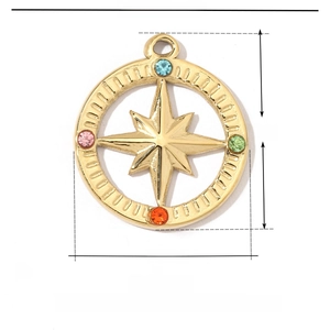 Detail of 21mm gold compass pendant with colorful rhinestones and size measurements
