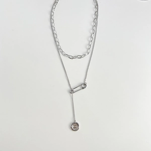 Double layer silver stainless steel necklace with safety pin and round luck pendant