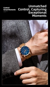 Detail of men's chronograph quartz watch with rose gold case and blue dial on leather strap