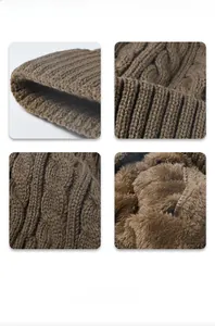 Detail of dark brown cable knit beanie with thick thermal fleece lining and ribbed edge