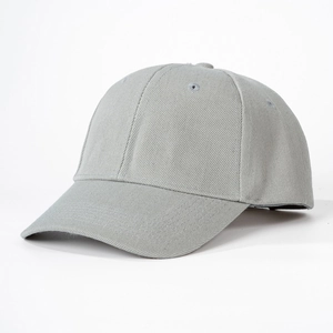 Close-up of light gray baseball cap showing breathable eyelets and twill cotton texture