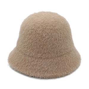 Minimalist beige faux mink fur bucket hat with warm plush texture for winter style