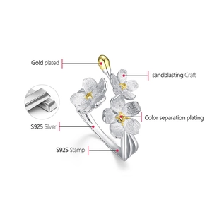 Detail of S925 silver forget-me-not ring with sandblasting craft and gold plating