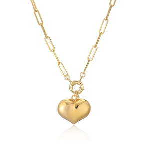 Detail of gold heart pendant with minimalist paperclip chain on white background