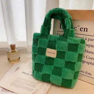 Green checkerboard plush fleece bucket handbag with brand label for winter fashion