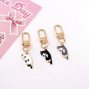 Three-piece set of cartoon enamel cat keychains with gold metal spring hooks