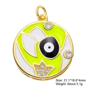 Macro detail of monster eye charm with green enamel and sparkling zircon inlay