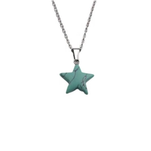 Macro detail of star pendant necklace with turquoise texture and silver chain link