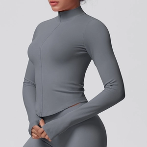 Close-up of sleeve thumbhole detail and ribbed texture on women yoga jacket