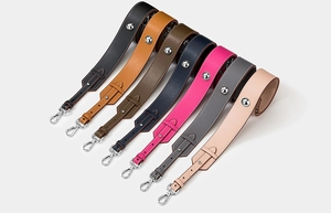 Selection of colorful leather bag straps with silver hardware and bead accents