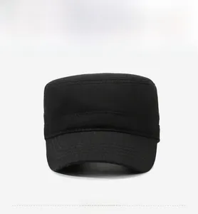 Detail of black cotton military flat cap with silver eagle emblem on the side