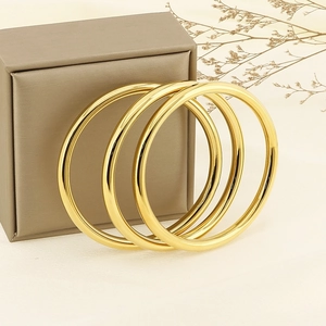 Three-piece set of 6mm hollow 18K gold plated titanium steel bangles for women