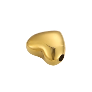 Detailed macro view of heart-shaped gold-plated stainless steel beads for DIY jewelry making