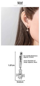 Detailed view of silver snowflake cross earrings with dimensions 1.87cm by 0.62cm