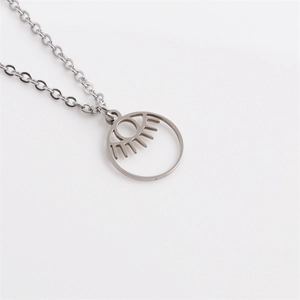 Silver stainless steel necklace featuring a hollow evil eye pendant on a fine link chain