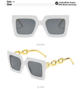 Detalle de gafas de sol blancas cuadradas con patillas de cadena de metal dorado de moda