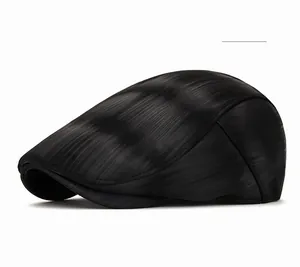 Detailed side view of black textured ivy cap showing fine fabric ribs and smooth brim