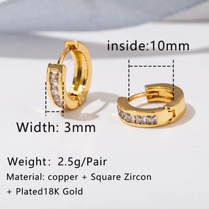 Macro shot of 18K gold plated hoop earrings featuring square cubic zirconia settings