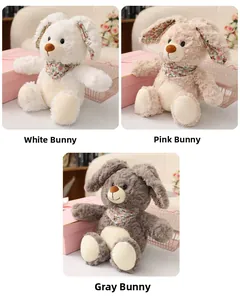 Tres conejitos de peluche de orejas largas en blanco, rosa y gris con forro floral