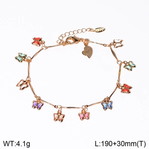 Charming gold-tone butterfly charm bracelet with colorful enamel pendants on white backdrop