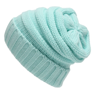 Detailed close-up of light blue chunky knit beanie showing ribbed cuff and thick texture