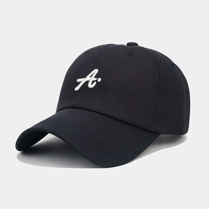 Close-up of premium 3D white A-letter embroidery on a black cotton baseball cap