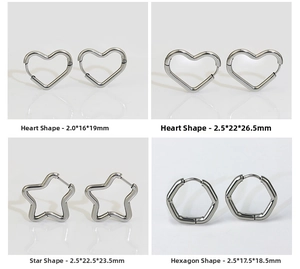 Detail view of heart, star, and hexagon stainless steel hoop earrings in various sizes