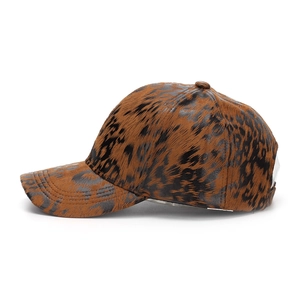 Side view of leopard print baseball cap with faux horsehair texture and curved brim