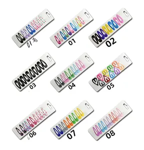 Détail de 9 sets de barrettes BB en métal en forme de goutte d'eau avec motifs variés