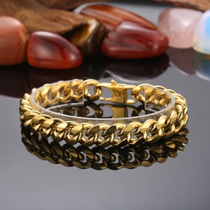 Polished gold Cuban link bracelet for men featuring a sturdy buckle and mirror finish