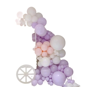 Macaron pastel balloon arch kit with purple pink and white latex balloons in various sizes