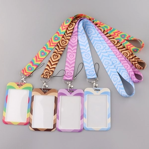 Flat lay of colorful heart patterned polyester lanyards with matching ID card holders