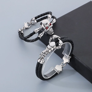 Men's black braided leather bracelet with stainless steel skull and scorpion charms