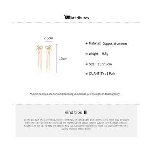 Detailed spec sheet showing material copper and dimensions for bow tassel earrings