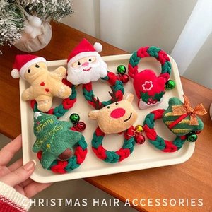 Set of 6 plush Christmas scrunchies featuring Santa, reindeer and festive motifs