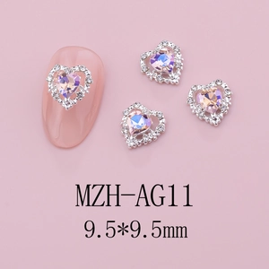 Detail of 9.5mm heart-shaped nail charm with silver metal base and pink crystal stones