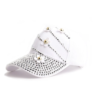 Detailed view of white baseball cap with silver rhinestones and 3D floral appliques