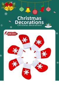 Set of 6 mini red Christmas stockings with white snowflake prints and hanging loops