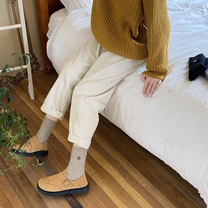 Detailed view of winter warm socks with flower embroidery and cozy velvet lining