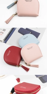 Detail of colorful shell-shaped PU leather coin purses with tassels and gold zippers