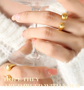 Chic 18k gold plated stainless steel teardrop rings worn on model's fingers