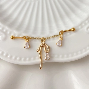 Golden industrial barbell with chain, bow design and clear teardrop cubic zirconia