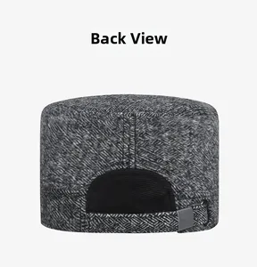 Rear view of winter flat cap with adjustable strap and textured grey tweed fabric