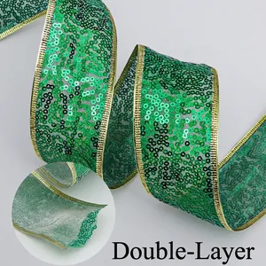 Detail of double-layer green sequin ribbon with gold edges for Christmas tree decoration