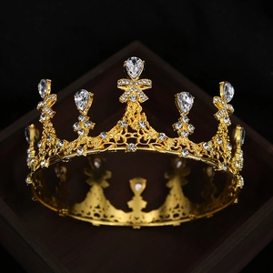 Baroque gold crown for brides with rhinestones and elegant bow hollow filigree