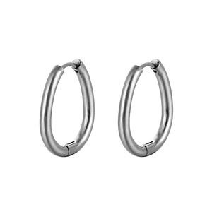 Detailed view of silver stainless steel hoop earrings in a minimalist geometric circular style